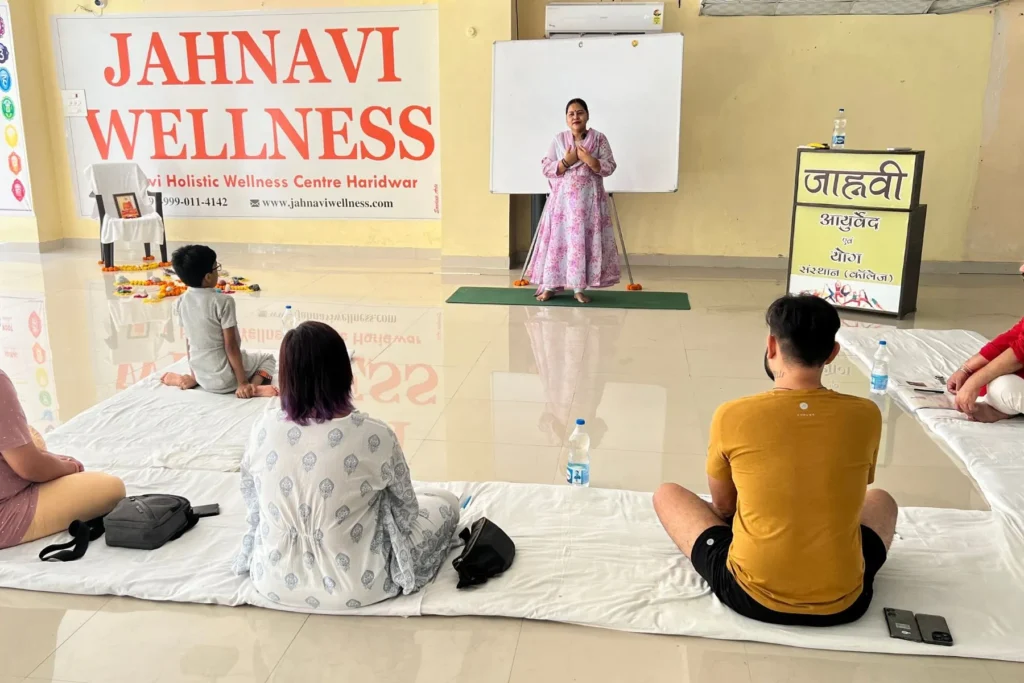 Ayurveda and yoga workshop at Jahnavi Wellness during a healing retreat in Haridwar